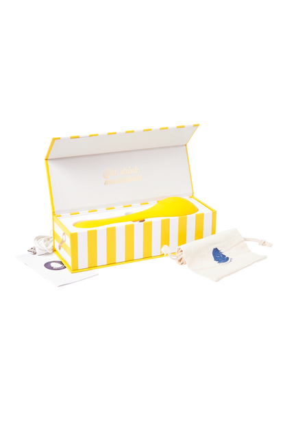 Coco Summer Love in yellow is a limited edition vibrator, displayed in a beautiful yellow striped box.