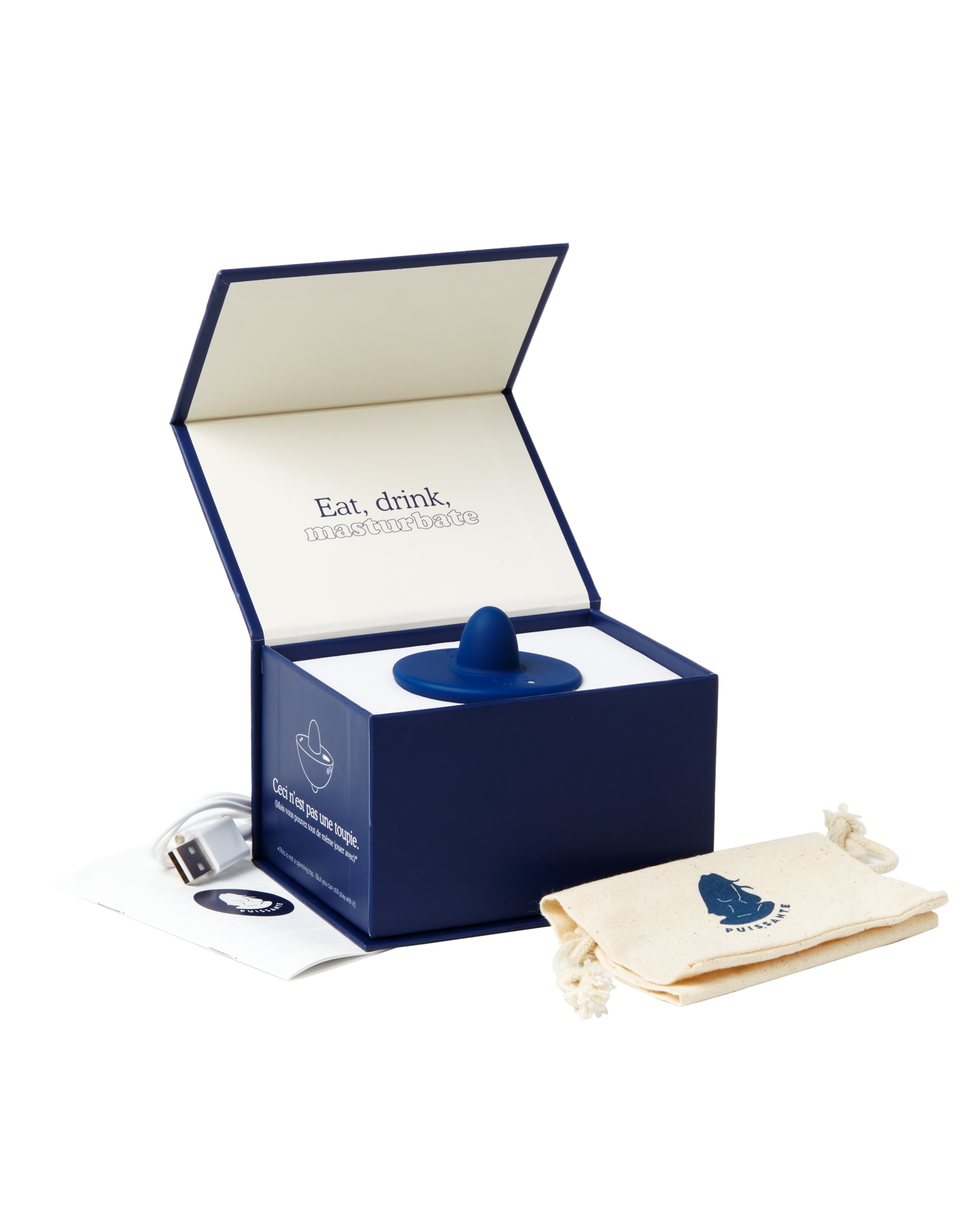 Puissante Toupie vibrator comes with a USB charger and storage pouch in an elegant navy blue box.