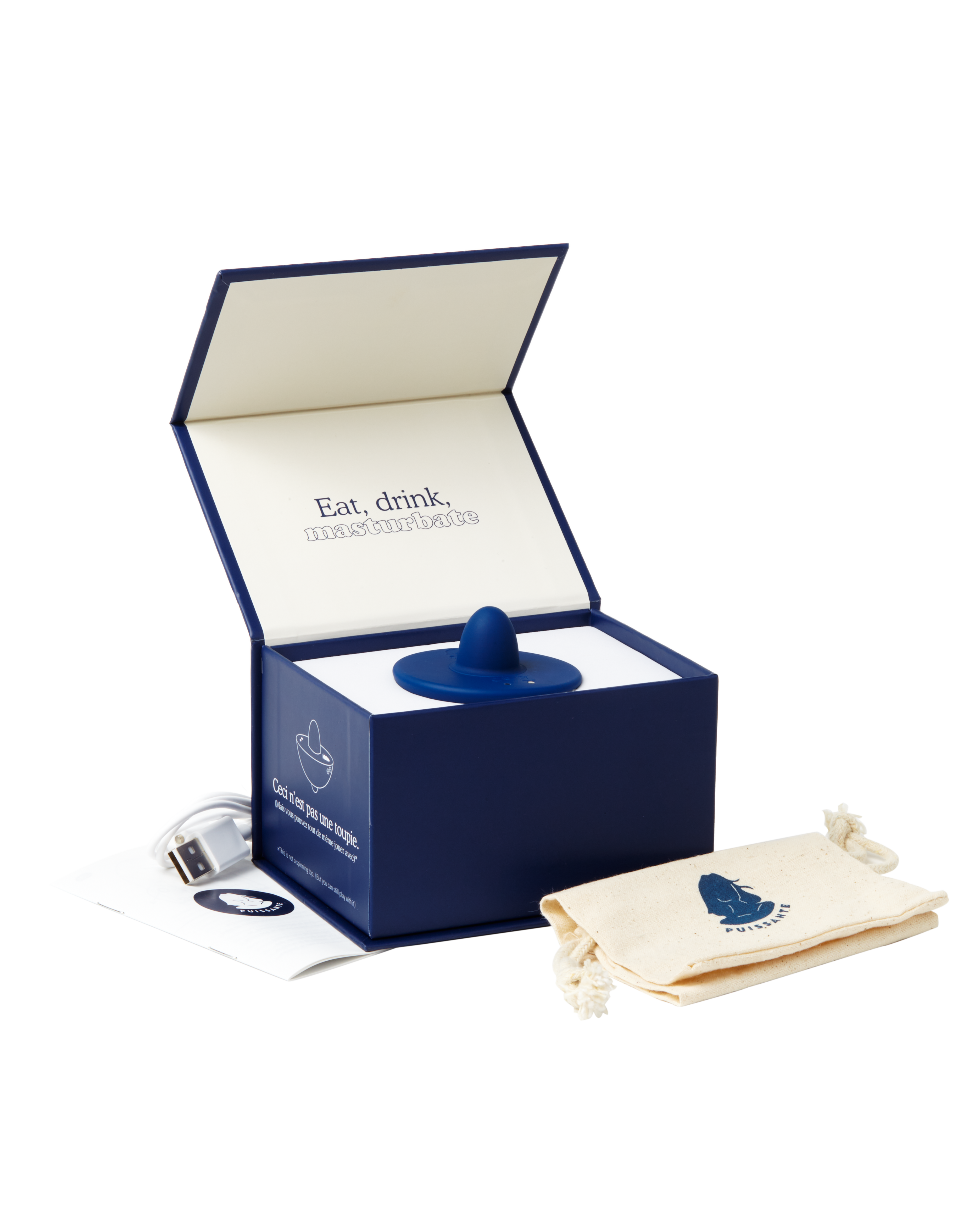 Puissante Toupie vibrator comes with a USB charger and storage pouch in an elegant navy blue box.