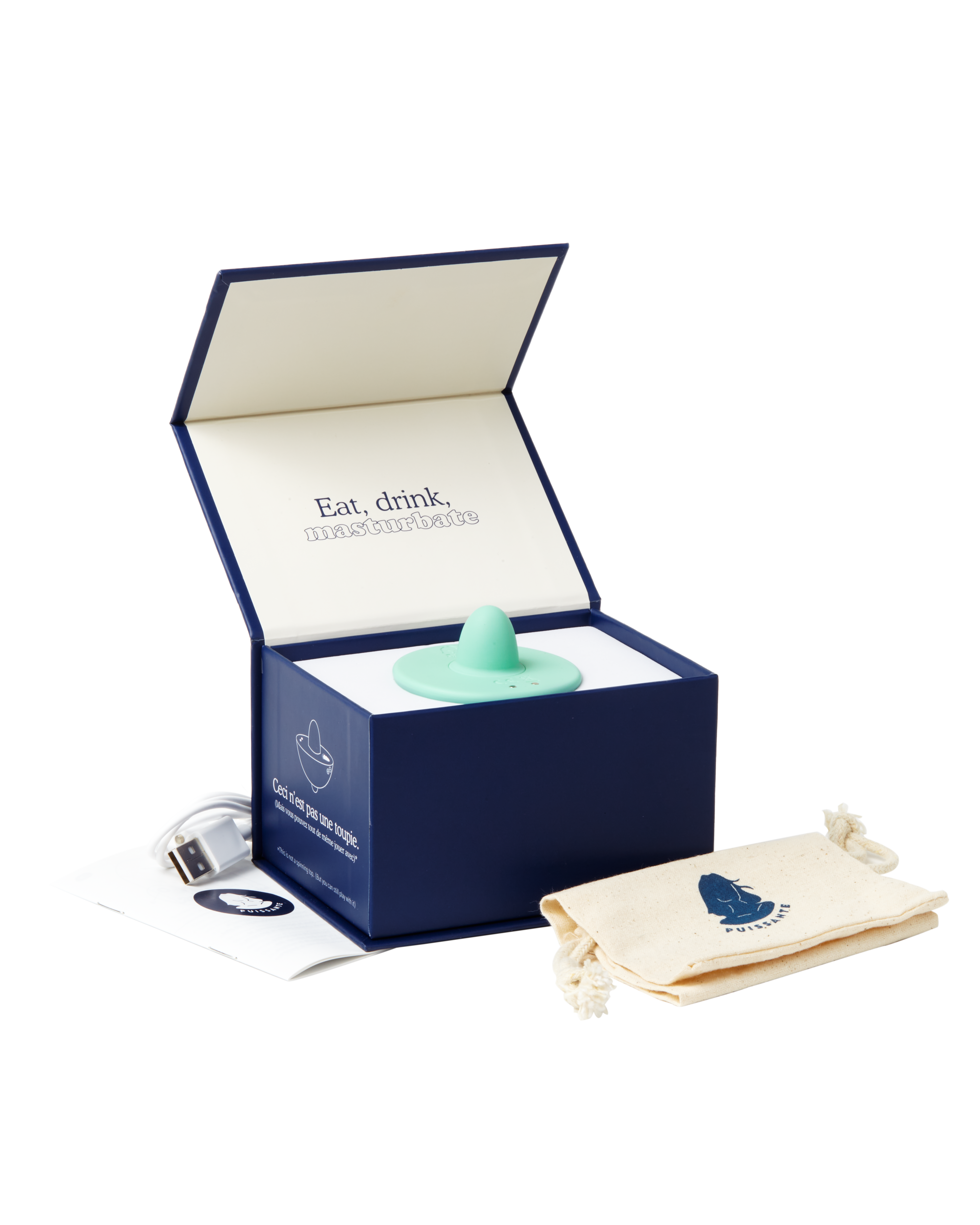 Puissante Toupie vibrator comes with a USB charger and storage pouch in an elegant navy blue box.